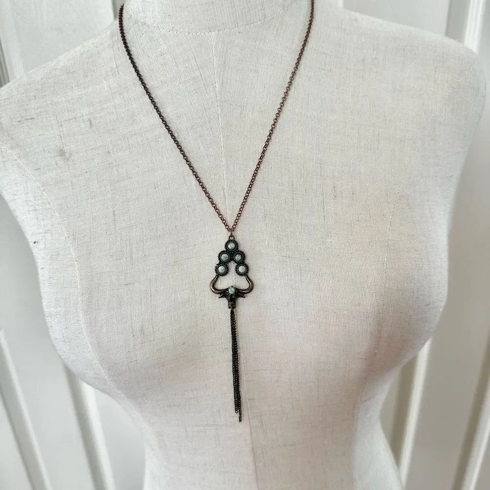 Long blue and copper tone tassel pendant necklace